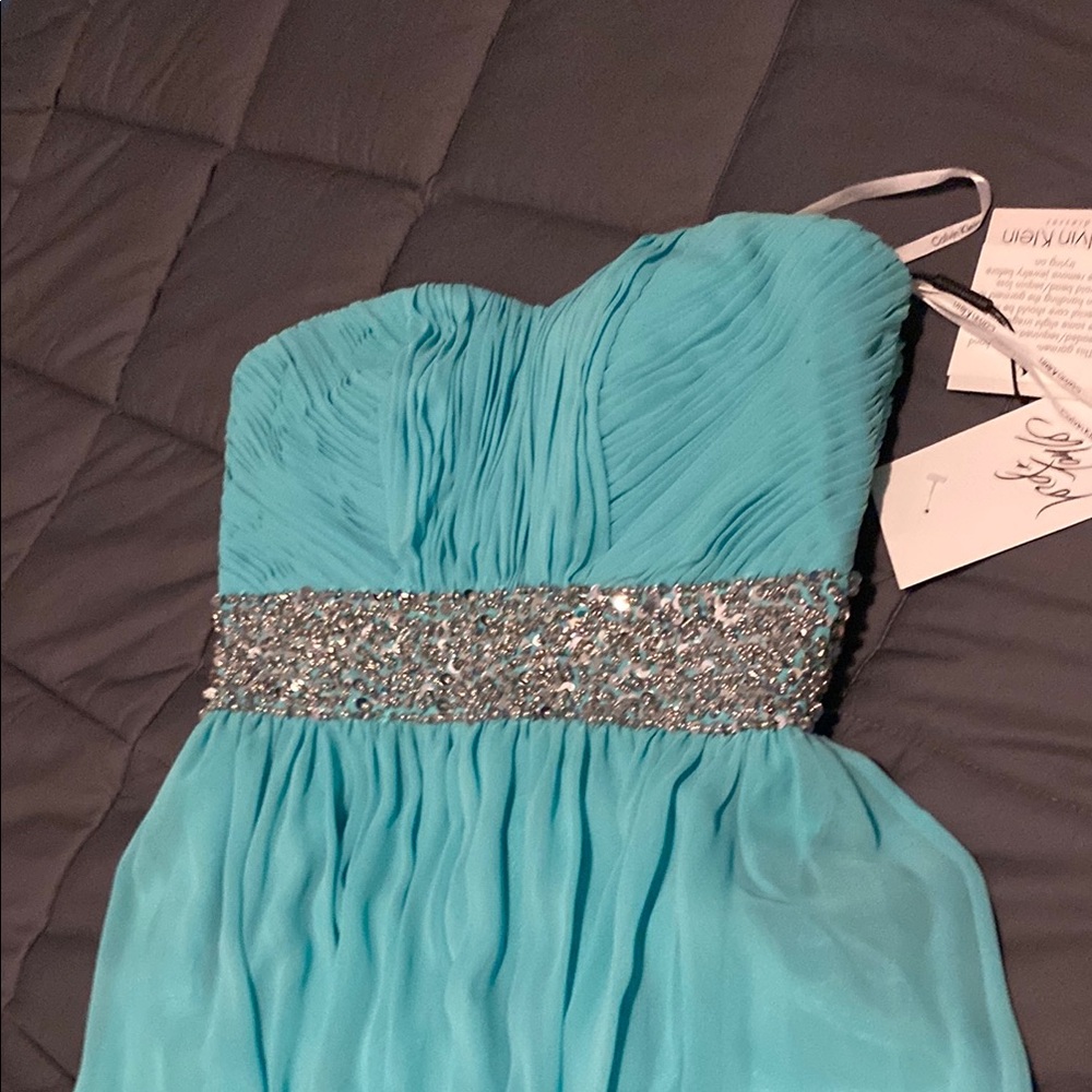 Elegant Calvin Klein Turquoise Strapless Dress with Silver Accents